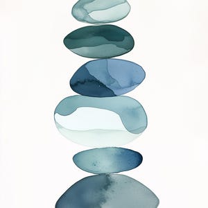 Puede incluir: Una pila de seis piedras lisas de forma ovalada en tonos azules y verdes. Las piedras están equilibradas una encima de la otra, creando una composición zen.