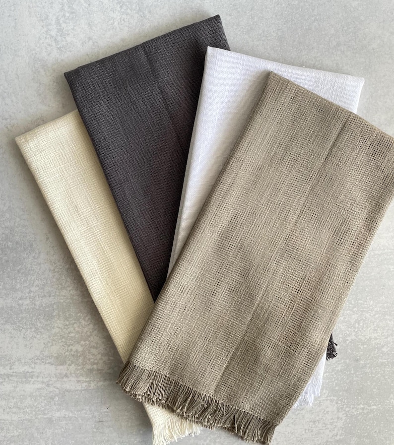 There are four different colors of towels to choose from white cream, charcoal, gray, or khaki (reads green/brown).  each towel is made from 100% cotton has a slub texture and has a fringe end.  In the kitchen on the counter or hanging on the stove.