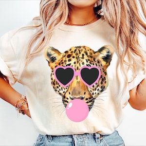 Cheetah blowing bubble png Cheetah PNG Cheetah Mascot Preppy PNG Preppy Mascot PNG black with pink heart glasses Shirt Sublimation