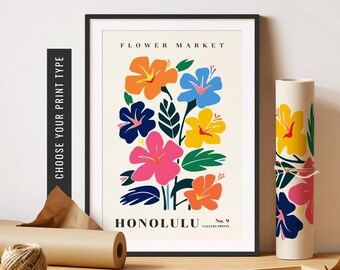 May include: A colorful poster with a floral design. The poster features a bouquet of hibiscus flowers in shades of orange, yellow, pink, blue, and green. The text "FLOWER MARKET HONOLULU No. 9 GALLERY PRINTS" is printed at the bottom of the poster.
