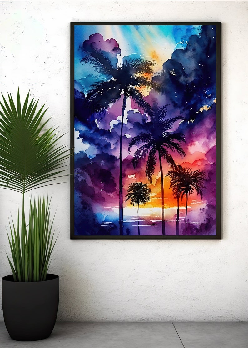 May include: A framed watercolour painting depicting palm trees against a sunset. The sky blends blues, purples, oranges, and yellows. The silhouettes of the trees are dark. The artwork has a black frame, creating a tropical scene.