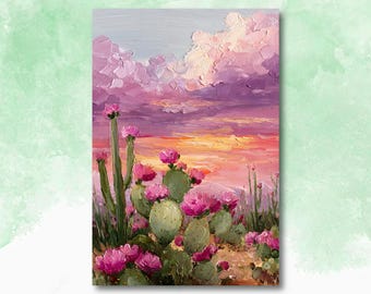May include: Oil painting of a desert landscape featuring blooming cacti under a sunset sky. The sky transitions from orange to purple, with fluffy pink clouds. The cacti have green pads and pink flowers.