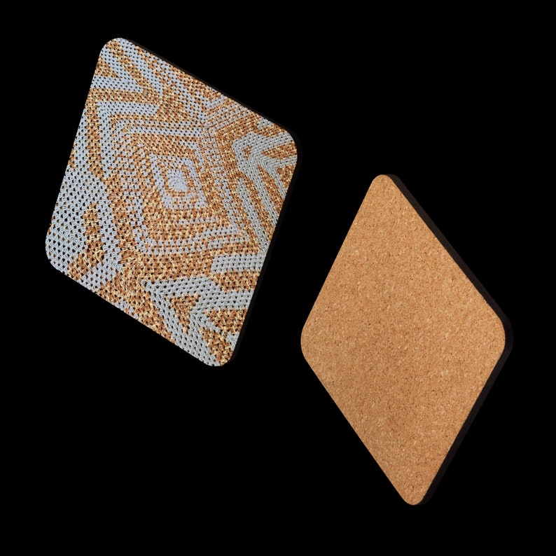 May include: Two diamond-shaped coasters. One has a woven pattern in tan and light blue. The other is made of cork. These coasters are designed to protect surfaces from heat and moisture, ideal for drinks.