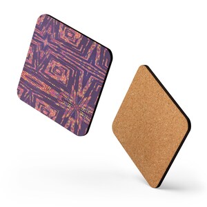 May include: Two square coasters with rounded corners. One has a geometric pattern in purple, pink, and yellow. The other is cork. Both have a black border. The coasters are suitable for placing drinks on.