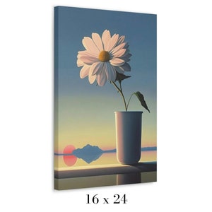 May include: A canvas print featuring a large white daisy with a yellow center in a white vase. The background depicts a sunset over a body of water with a mountain range. The canvas measures 16 x 24 inches.
