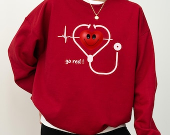 Go Red Heart Health Nurse Sweatshirt, Heart Month Awareness Shirt, Wear Red Day Crewneck, Healthcare Nurse Gift