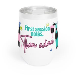 May include: White wine tumbler with a pink and blue design. The tumbler has the text "First session notes, then wine" on it.