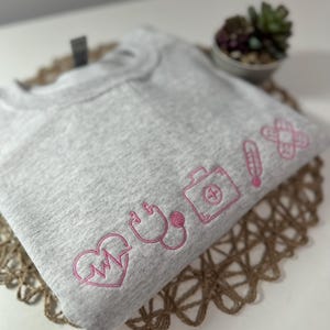 Embroidered Nurse Sweatshirt, Custom Nursing Grad Sweater, Nurse Cute Icons sweatshir, Nurse Glitter Applique Embroidered Sweatshirt RN gift