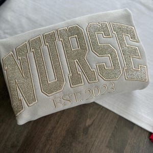 Embroidered Glitter Nurse Sweatshirt: New Grad Gift