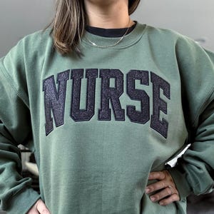 Glitter Nurse Sweatshirt: Embroidered Varsity Style - RN Gift, Nursing gift, LPN gift, Labor and delivery, ICU, Emergency, Medsure nurse