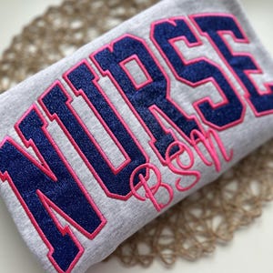 Embroidered Nurse Sweatshirt, Custom Nursing Grad Sweater, Personalized RN Sweatshirt, Graduation Gift Glittery nurse embroidered sweatshirt