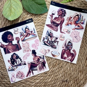 May include: Two sheets of stickers featuring illustrations of women in various self-care activities. The stickers are on a white background with the text "me time stickers" at the top of each sheet. The stickers depict women taking baths, reading, and drinking wine.