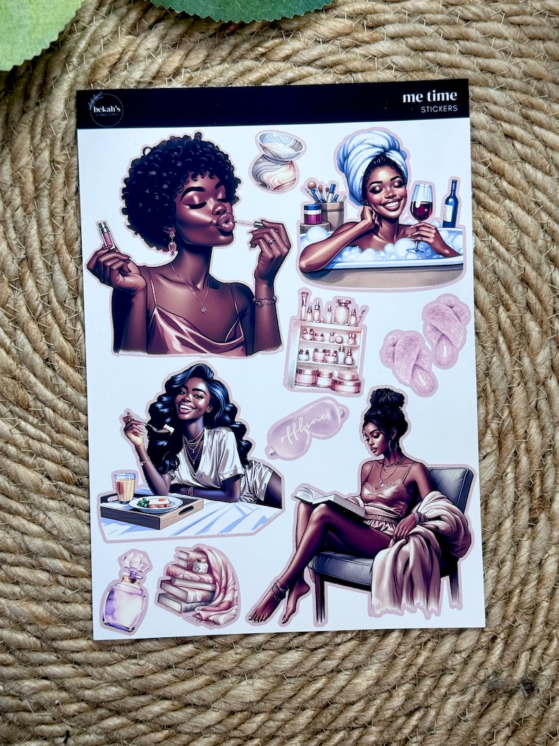May include: A sheet of stickers featuring illustrations of Black women in various self-care activities, including taking a bath, reading a book, and applying makeup. The stickers are pink and white and have the text "me time stickers" on the top.