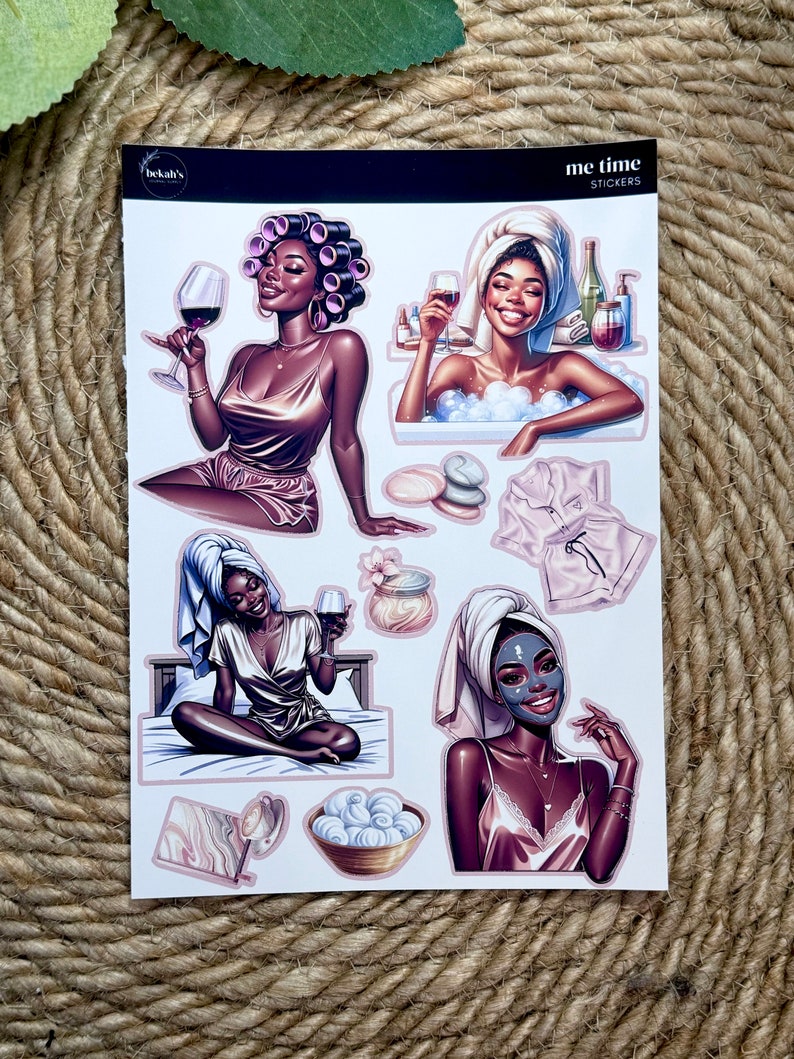May include: A set of six stickers featuring illustrations of a Black woman in various self-care activities. The stickers are titled "me time stickers". The illustrations include a woman with rollers in her hair holding a glass of wine, a woman in a bathtub with bubbles, a woman in a bathrobe holding a glass of wine, a woman in a bathrobe sitting on a bed, a woman with a face mask on, and a pink bathrobe.