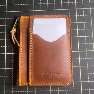 Cartera de piel con cremallera