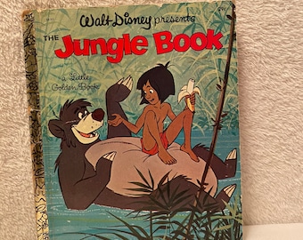 May include: A vintage Little Golden Book titled "The Jungle Book" featuring a cartoon illustration of Mowgli and Baloo. The book cover is blue and green with the title in red and white.