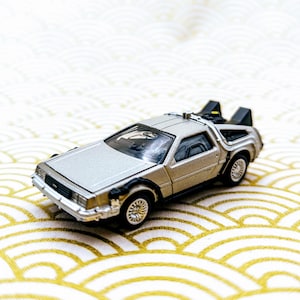 Authentic Tomica DeLorean Time Machine – Back to the Future 1:64 Diecast Car – Japan Import Collectible, Movie Icon Gift