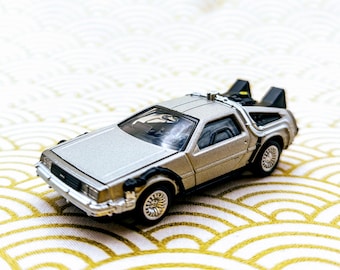 Authentic Tomica DeLorean Time Machine – Back to the Future 1:64 Diecast Car – Japan Import Collectible, Movie Icon Gift