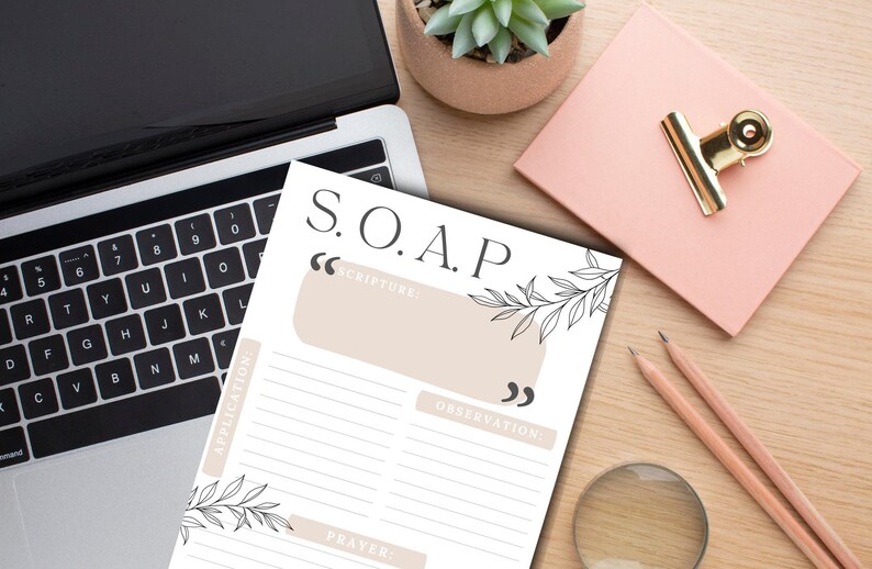 May include: A white printable worksheet with the acronym "S.O.A.P." in black text. The worksheet is divided into four sections: Scripture, Observation, Application, and Prayer. Each section has a line for writing. The worksheet is decorated with black line drawings of leaves.