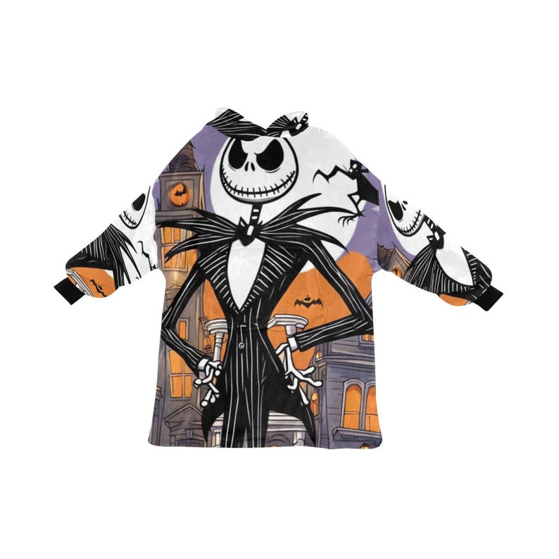 May include: A white hooded sweatshirt with a black and white print of Jack Skellington from The Nightmare Before Christmas. The print features Jack Skellington standing in front of a purple and orange moon with a spooky Halloween town in the background.