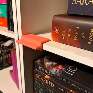 Espaçador de estante: Alisador de livros (espaço de 2,5 cm)