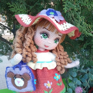 35-35 cm doll with removable clothes