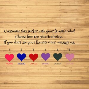 May include: Six heart-shaped color swatches on a wood background. The colors are: pink, blue, red, purple, dark green, and light pink. The hex codes for each color are listed below the swatches.