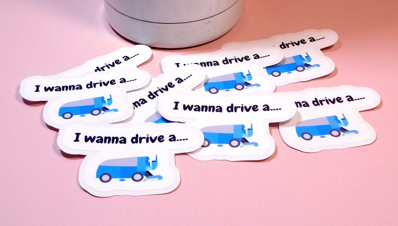 May include: A set of eight stickers featuring a blue street sweeper with the text "I wanna drive a..." repeated on each sticker.