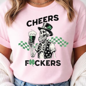 May include: A white ceramic mug with a black handle and the text "But First, Coffee" in a bold, black font. The mug is set against a blurred background, suggesting a cozy setting. The mug appears to be approximately 4 inches tall.