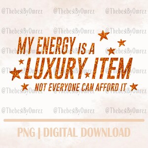 Puede incluir: Gráfico de descarga digital con el texto "MY ENERGY IS A LUXURY ITEM, NOT EVERYONE CAN AFFORD IT." El texto es dorado brillante, con estrellas doradas. La parte inferior de la imagen dice "PNG | DIGITAL DOWNLOAD."