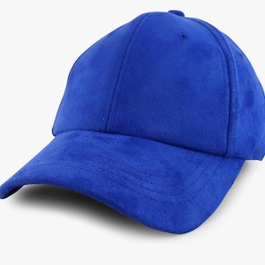 May include: A solid blue suede baseball cap.