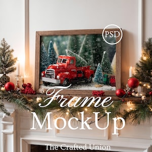 May include: A framed Christmas scene featuring a red vintage truck carrying a Christmas tree, set against a snowy forest backdrop. The frame is brown, and the scene is decorated with miniature trees and gifts. The text "Frame MockUp" is displayed.