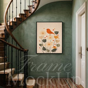 May include: A framed art print depicting an orange bird and floral design in cream, grey, and yellow hues. The artwork is set against a neutral backdrop and framed in black. The print is displayed in a hallway with a staircase and a patterned floor.