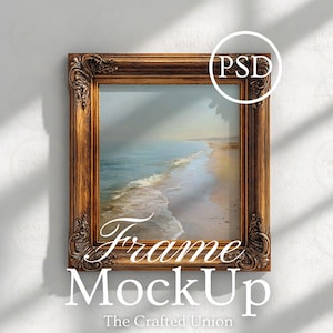 May include: A rectangular, ornate, brown picture frame with a landscape painting of a beach scene. The frame has detailed carvings. The text "Frame MockUp" and "The Crafted Union" are displayed in white script. A white circle with the letters "PSD" is in the upper right corner.