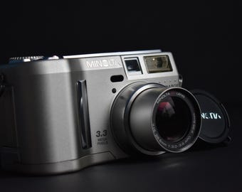 Minolta Dimage S304 Minolta Lens GT 7.15-28.6mm 1:3.0-3.6 APO Digital Camera