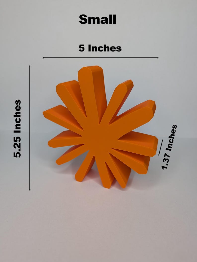 A small, orange, sunburst-shaped logo is shown with text indicating its dimensions: "Small," "5 Inches" wide, "5.25 Inches" tall, and "1.37 Inches" deep.
