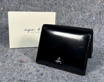 Cartera vintage de piel negra de la marca francesa Agnes.B