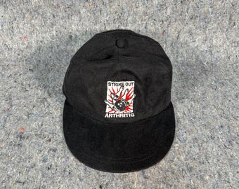 Gorra vintage negra Molson Strike Out Arthritis con correa en la parte posterior