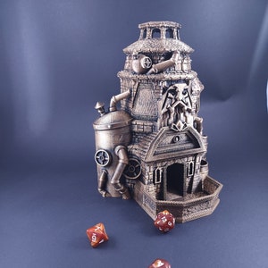 May include: A bronze 3D printed dice tower shaped like a miniature building with a turret and a door.  The tower is surrounded by red dice with white numbers.