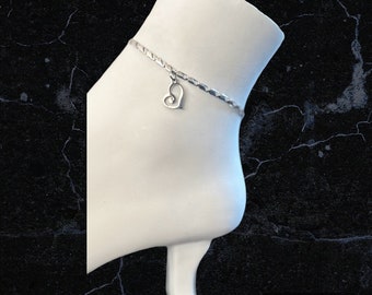 stainless steel ankle chain and heart pendant.