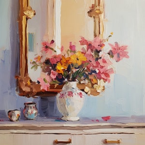 May include: A white ceramic vase with pink and yellow floral designs holds a bouquet of pink, yellow, and white flowers. The vase is sitting on a white countertop in front of a gold-framed mirror.