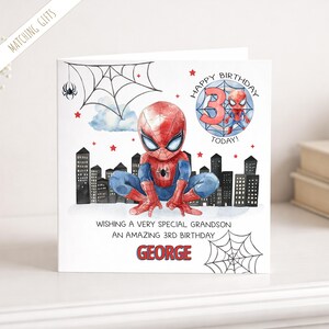 May include: A white birthday card with a Spider-Man illustration. The card has the text "Happy Birthday 3 Today!" and "Wishing a very special grandson an amazing 3rd birthday George."