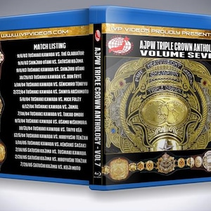 May include: A blue DVD case with a gold and black wrestling championship belt on the front. The title "AJPW Triple Crown Anthology Volume Seven" is printed on the case. The back of the case lists matches from the anthology.