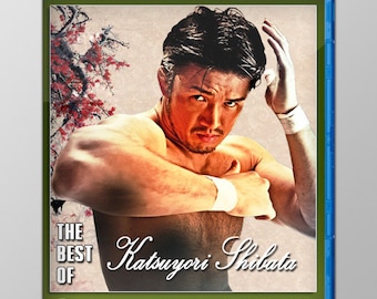May include: A blue Blu-ray disc case with a photo of a wrestler on the front. The wrestler is wearing a white wrestling strap and has a serious expression on his face. The text on the case reads "The Best of Katsuyori Shibata" and "Your #1 Source for Puroresu DVD & Blu-ray".