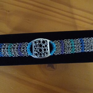Bracelet with Silver Oval centerpiece and multi-color chain cuff