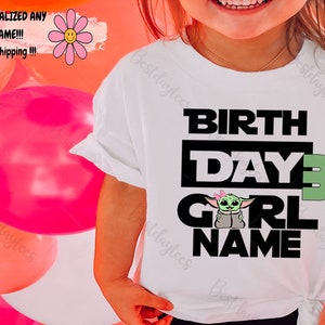 May include: White t-shirt with black text that reads "BIRTHDAY 3 GIRL NAME". A green cartoon character with pink bows is above the word "GIRL".