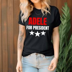 May include: A set of three ceramic mugs with a speckled, matte finish. The mugs are in shades of cream, light brown, and dark brown. Each mug has a simple, minimalist design, perfect for coffee or tea.