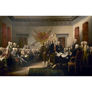 May include: An oil painting depicting a large group of individuals in 18th-century attire gathered in a formal room. Several figures stand around a central table covered with documents, while others are seated in chairs arranged throughout the space.