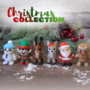 May include: A collection of Christmas figurines, including a snowman, elf, reindeer, Santa Claus, gingerbread man, and a green character. The figurines are arranged on a wooden surface with decorative accents and the text "Christmas COLLECTION".