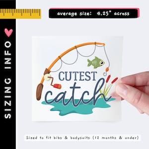 May include: A square decal featuring an orange fishing rod, a green fish, and the text "CUTEST catch" in blue. The design includes a teal water graphic and red cattails. A ruler indicates an average size of 4.25 inches across for the decal.